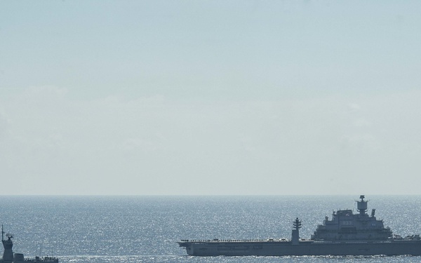 The Indian Navy's INS Vikramaditya and The Royal Australian Navy's HMAS Ballarat Perform a Farewell Steam Pass