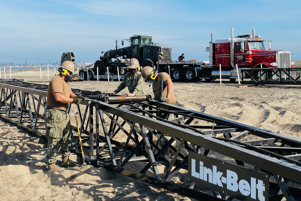 Naval Mobile Construction Battalion FOUR conduct pile driving at Naval Air Station North Island