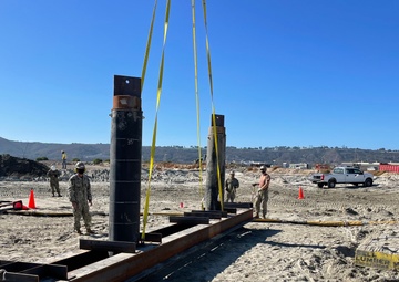 Naval Mobile Construction Battalion FOUR conduct pile driving at Naval Air Station North Island