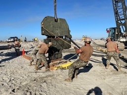 Naval Mobile Construction Battalion FOUR conduct pile driving at Naval Air Station North Island