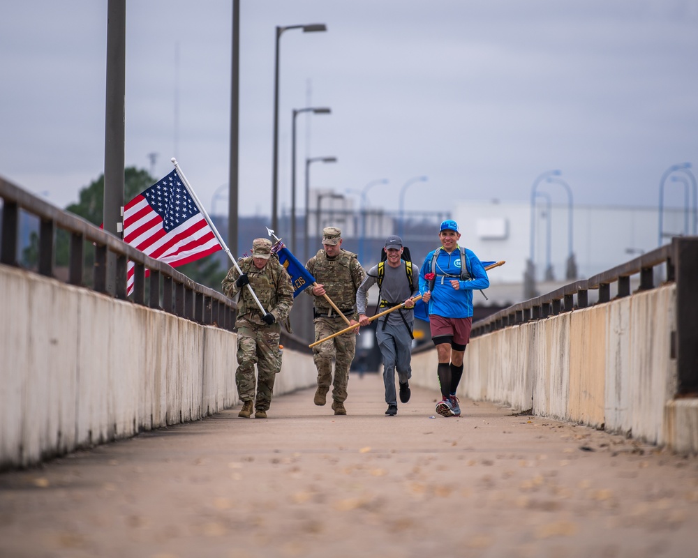 Tulsa Air National guardsmen run half marathon in honor of fallen Airman