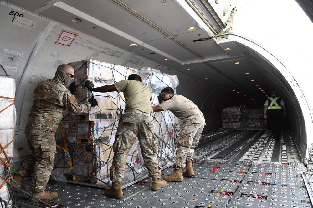 612th Air Base Squadron Unloads Pallets of Humanitarian Assistance