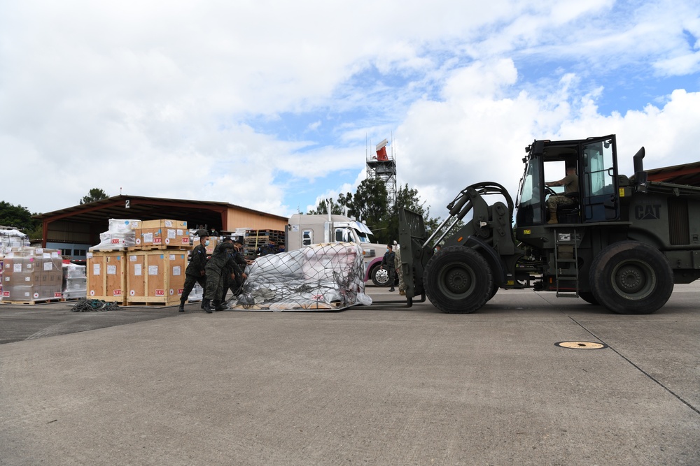 JTF-B and Members of the Honduran Air Force Unload Pallets of Humanitarian Assistance