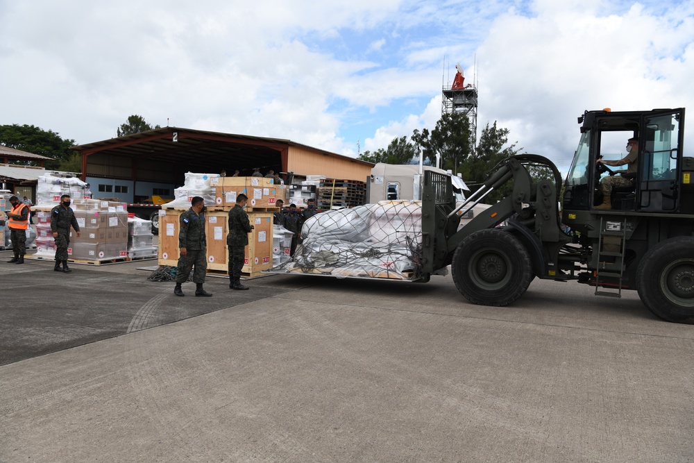 JTF-B and Members of the Honduran Air Force Unload Pallets of Humanitarian Assistance