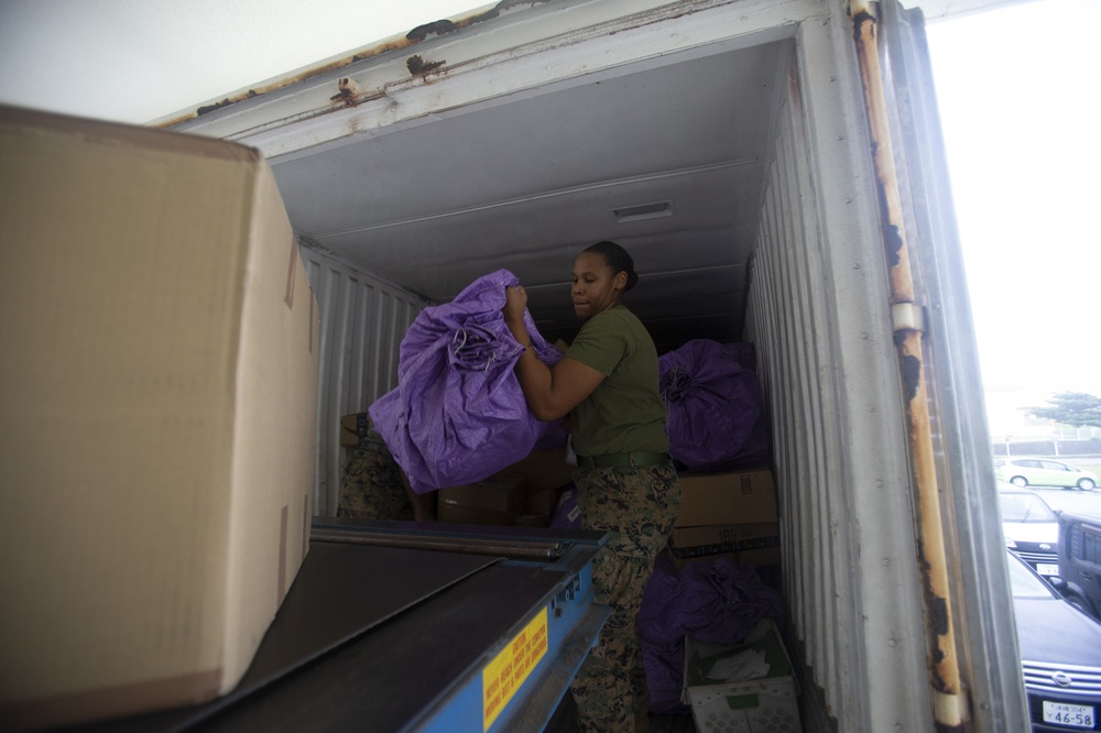 US Marines sort mail during their busiest time of year