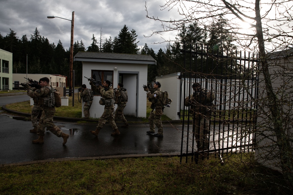 Soldiers follow Green Beret during training exercise