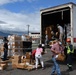 Honduran Volunteers Load Donated Medical Supplies and Equipment