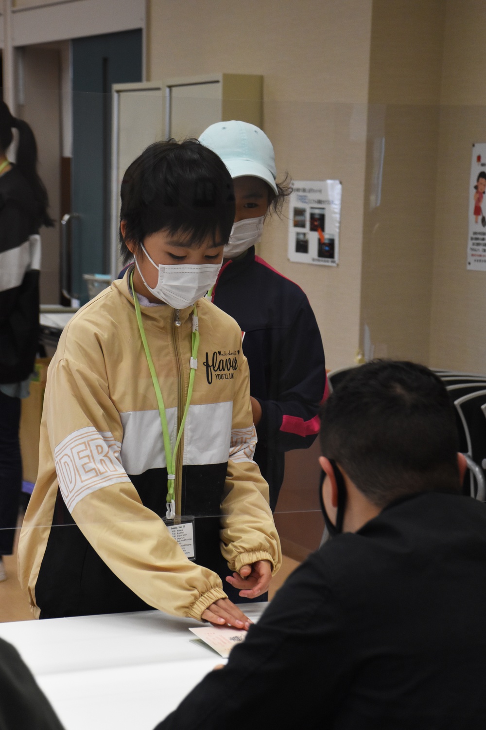 Camp Fuji Marines and Sailors guide local children through English lessons, culture exchange