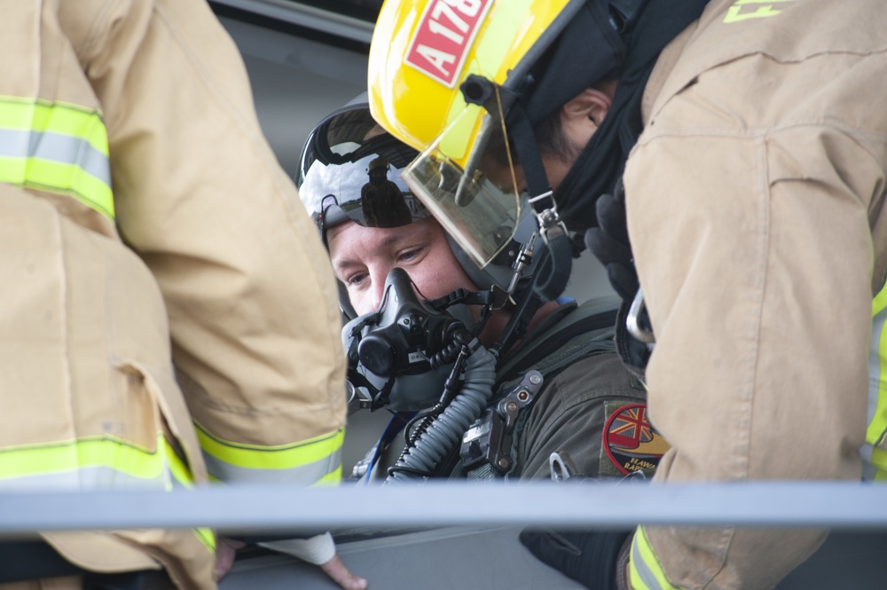 Response teams perform pilot recovery in joint exercise at JBPH-H