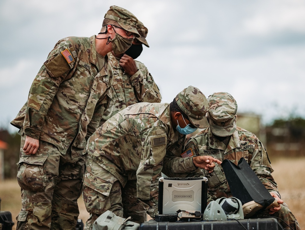 1-2 Stryker Brigade Combat Team Soldiers utilizing drone technology.