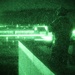 Green Beret scans rooftops