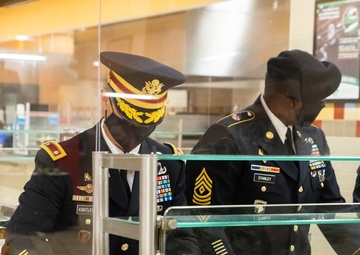 Lt. Col. Brian Kibitlewski and 1st Sgt. Antwan Stanley Serve Thanksgiving Meals