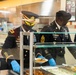 Lt. Col. Brian Kibitlewski and 1st Sgt. Antwan Stanley Serve Thanksgiving Meals