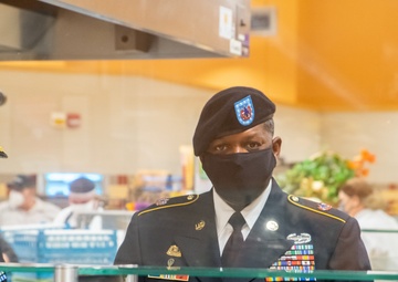 Lt. Col. Brian Kibitlewski and 1st Sgt. Antwan Stanley Serve Thanksgiving Meals