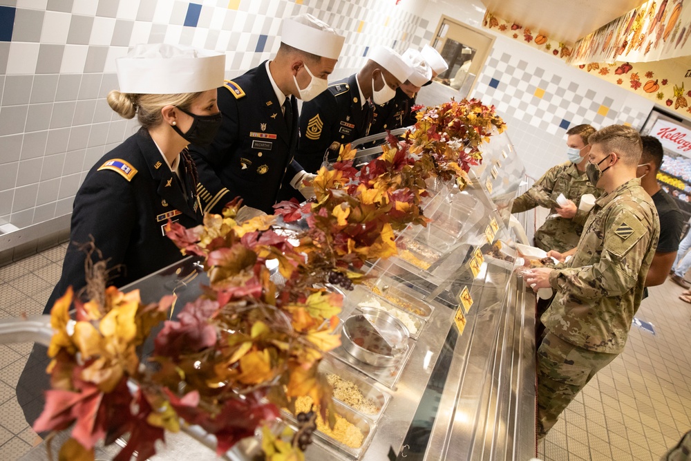 3rd Combat Aviation Brigade leadership serves their Soldiers and Families a Thanksgiving meal.