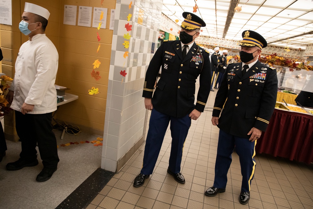 3rd Combat Aviation Brigade leadership serves their Soldiers and Families a Thanksgiving meal.
