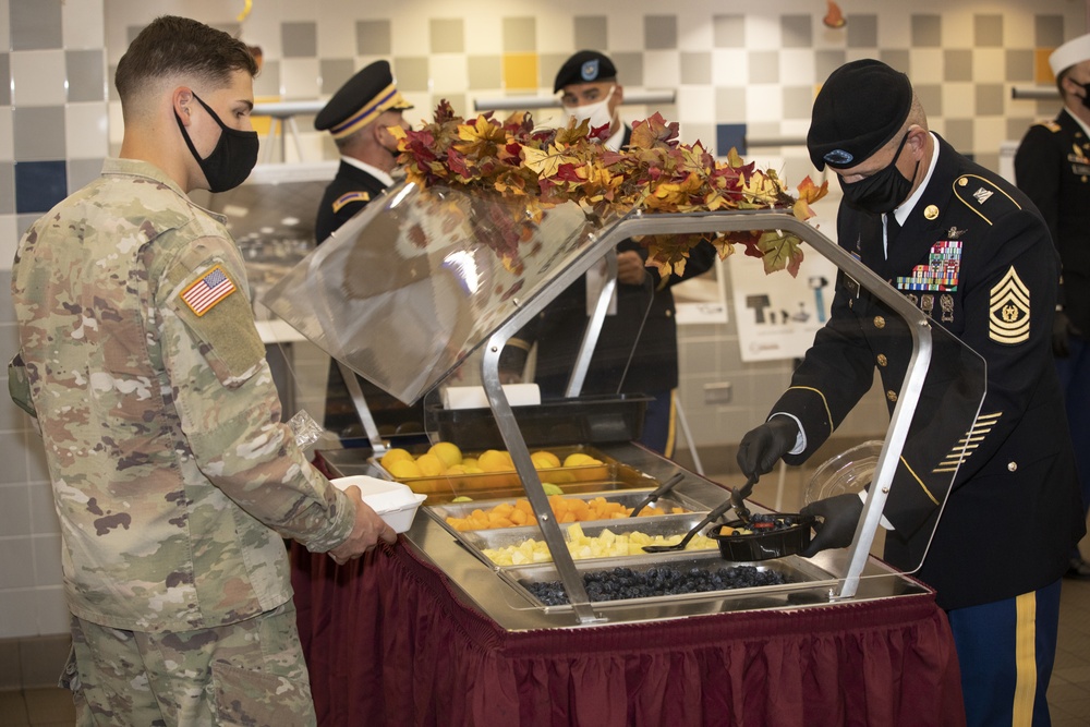 3rd Combat Aviation Brigade leadership serves their Soldiers and Families a Thanksgiving meal.