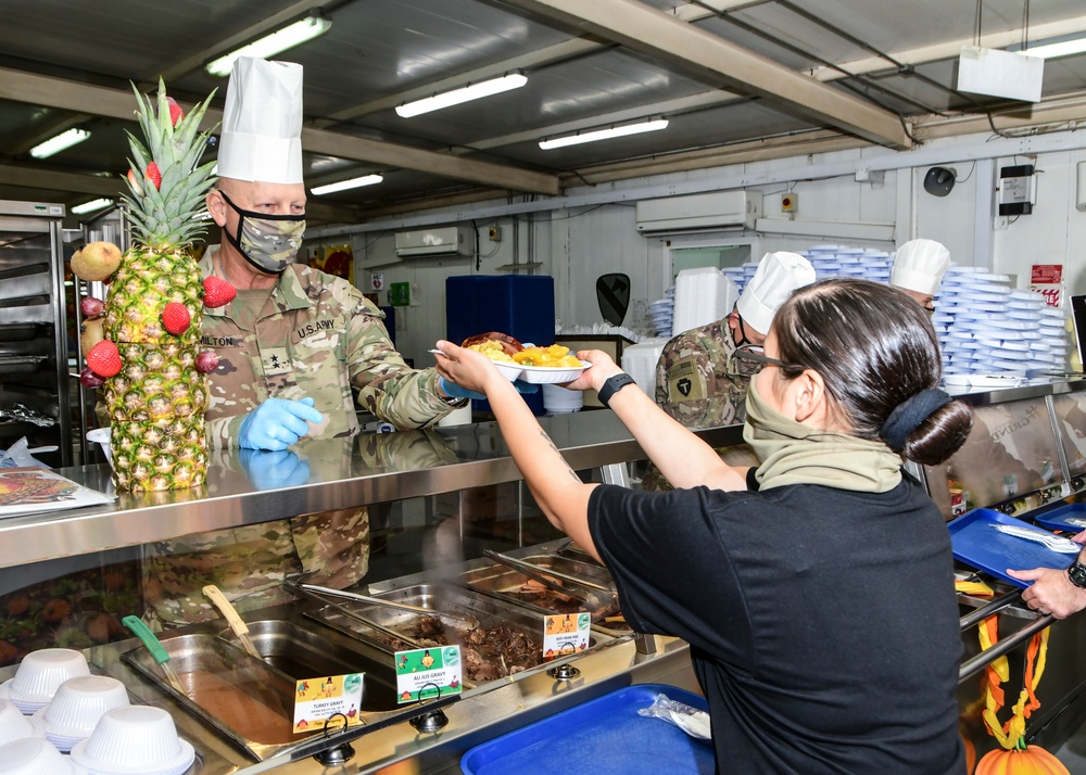 Soldiers Served Thanksgiving Meal by Commanders