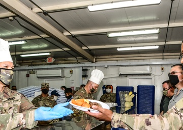 Soldiers Served Thanksgiving Meal by Commanders