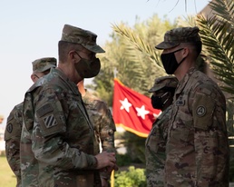 Lt. Gen. coins Soldiers for combating COVID-19