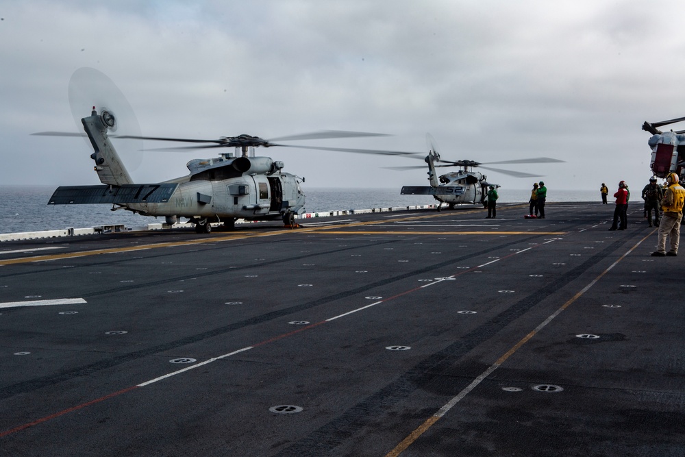 Sailors with HSM-49, HSC-23 conduct aerial live-fire range