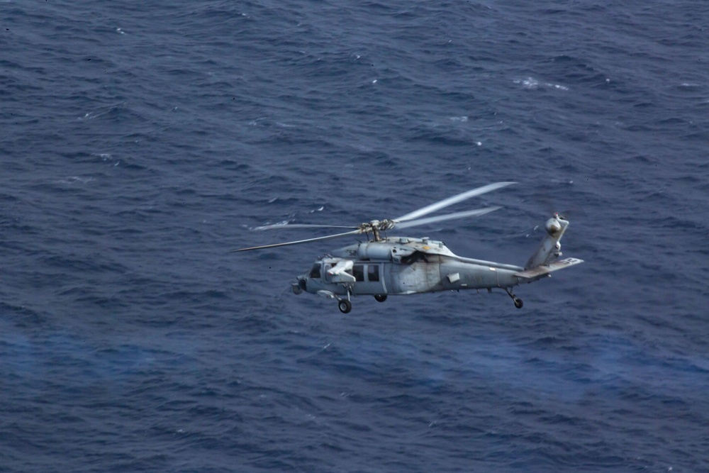 Sailors with HSM-49, HSC-23 conduct aerial live-fire range