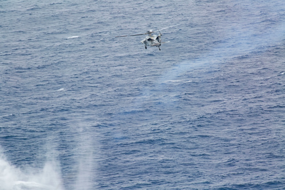 Sailors with HSM-49, HSC-23 conduct aerial live-fire range