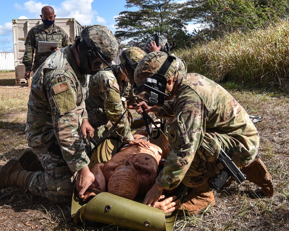 Medical team stabilizes victim during simulated exercise