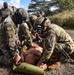 Medical team stabilizes victim during simulated exercise