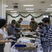 United Service Organizations (USO) Volunteers Support Marine Fighter Attack Squadron (VMFA) 312 With A Thanksgiving Dinner