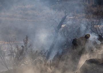 Camp Pendleton Fire Department fights a fire in 25 Area
