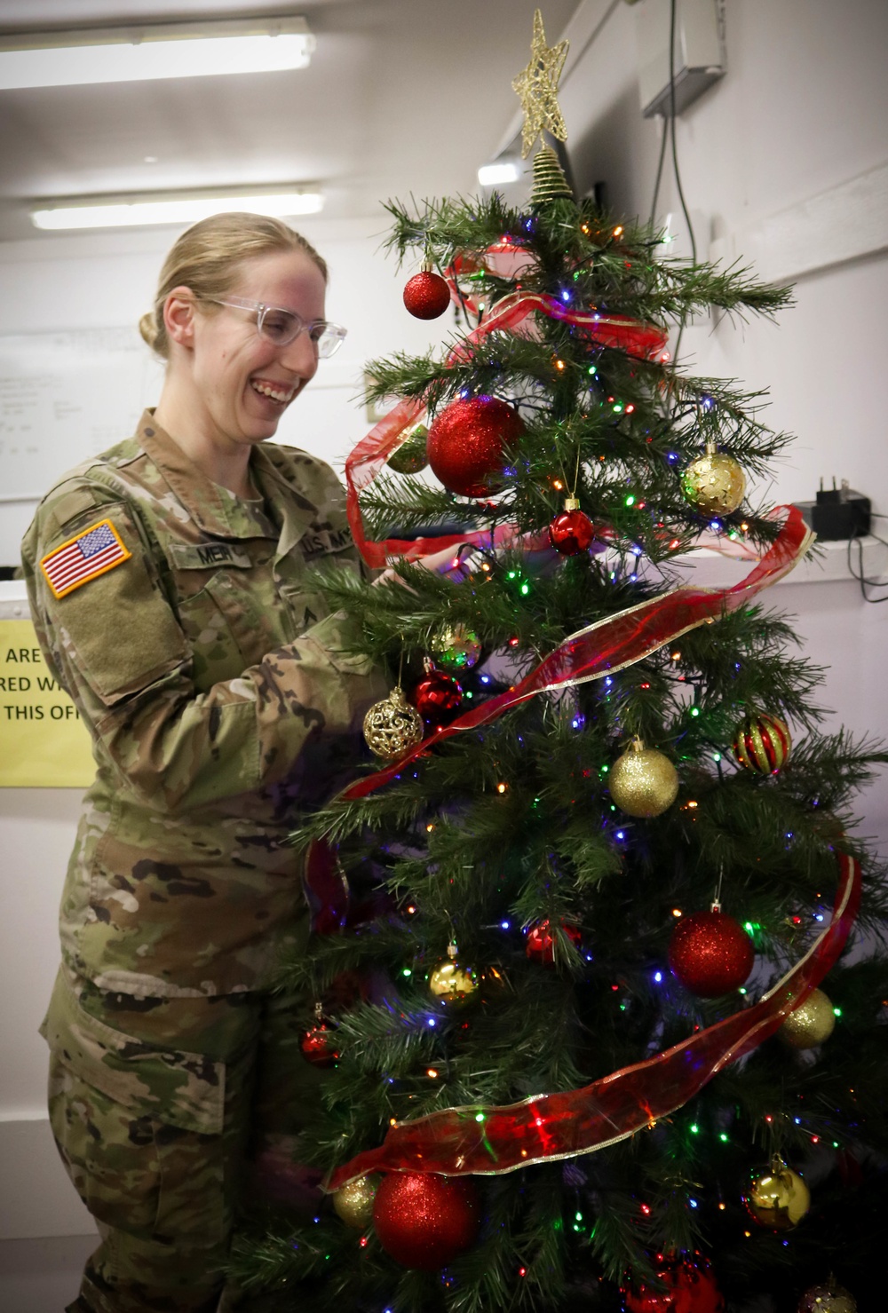 Soldier decorates for the holidays at Camp Bondsteel