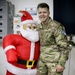 Soldier enjoys holiday deocrations at Camp Bondsteel