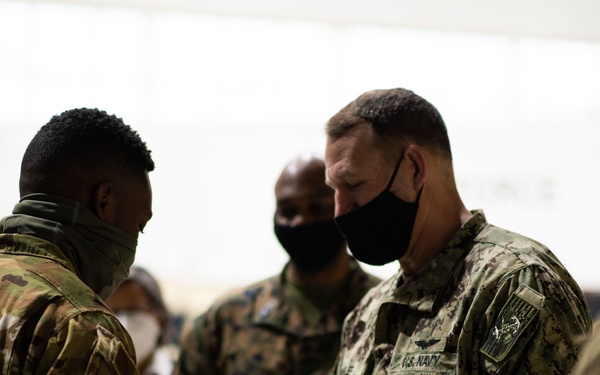 Rear Adm. William W. Wheeler III Visits Team Minot