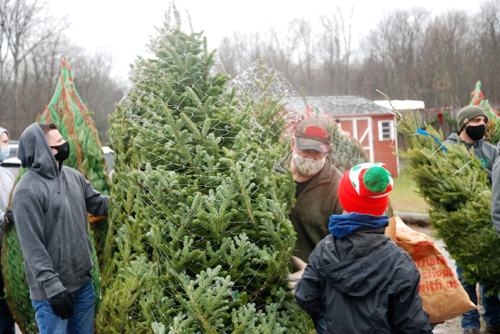 National Guard volunteers join veterans, volunteers for 2020 Trees for Troops loadout