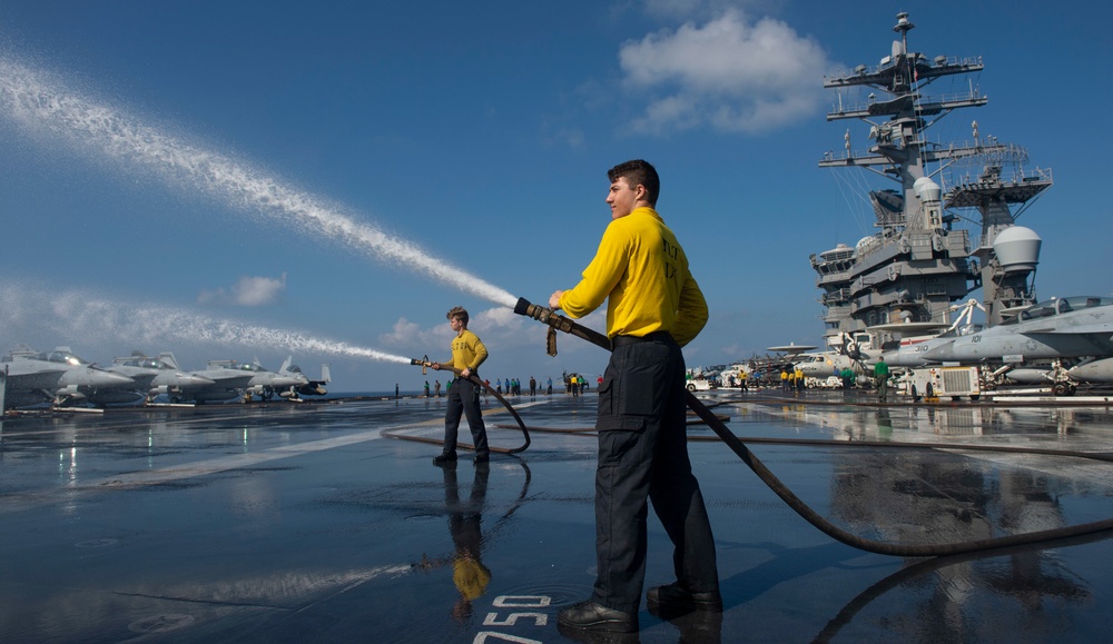 Sailors Conduct Freshwater Washdown