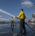 Sailors Conduct Freshwater Washdown