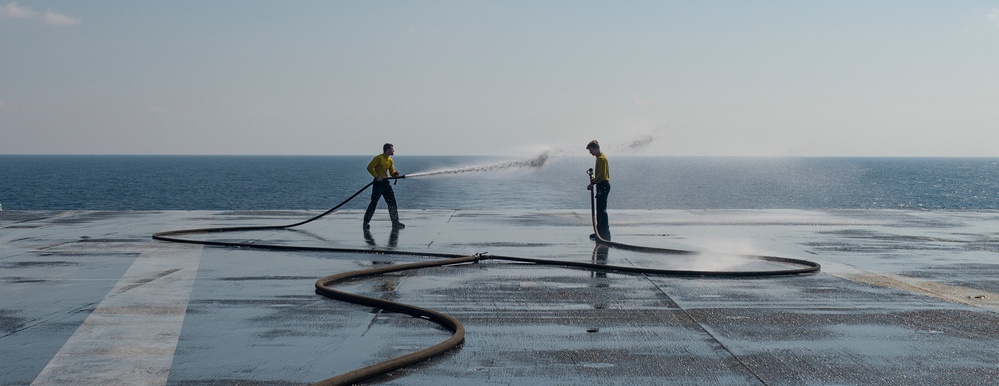 Sailors Conduct Freshwater Washdown