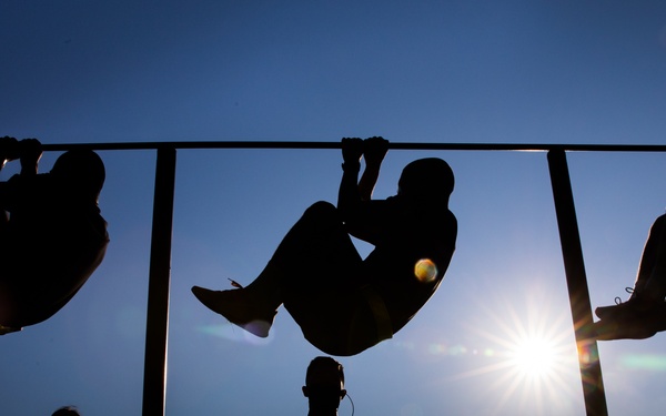Leg Tucks at Sunrise