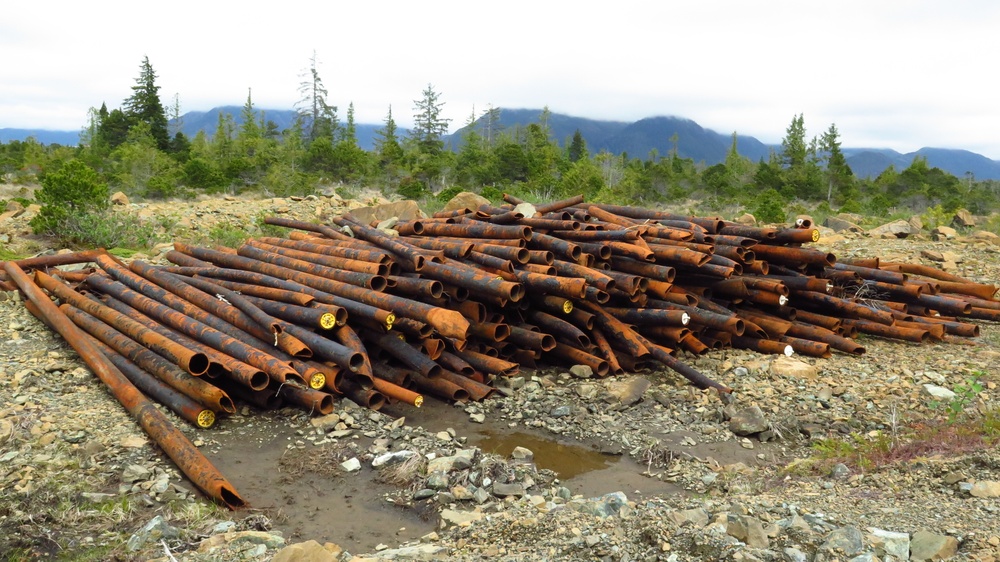 A pile of removed pipeline sits on Annette Island