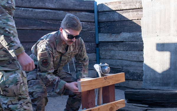 EOD drops BDU-33s to showcase handling procedures