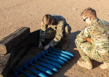 EOD drops BDU-33s to showcase handling procedures