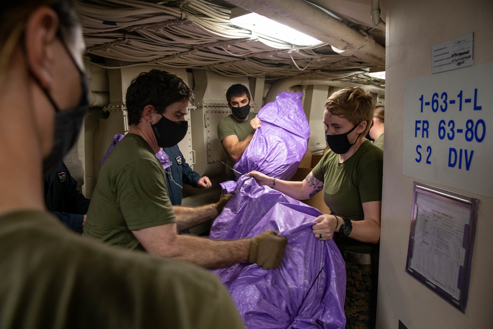 USS Somerset Marines, Sailors receive mail from USNS Guadalupe