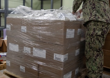 United States Naval Hospital Okinawa distributes flu vaccines to thousands of service members and families