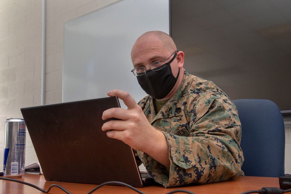 Marines work on computers