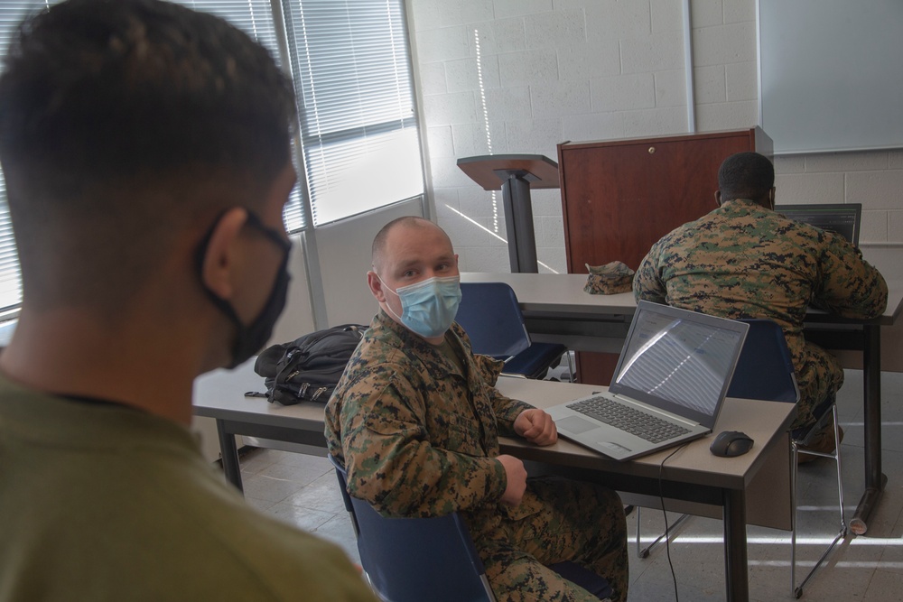 Marines work on computers