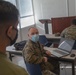 Marines work on computers