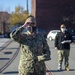 Electronics Technician 2nd Class Michelle Heinztelman recieves ball cap for getting her Basic Historian qualification aboard the USS Constitution.