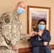 Liaison officer presents morale patch in El Paso hospital