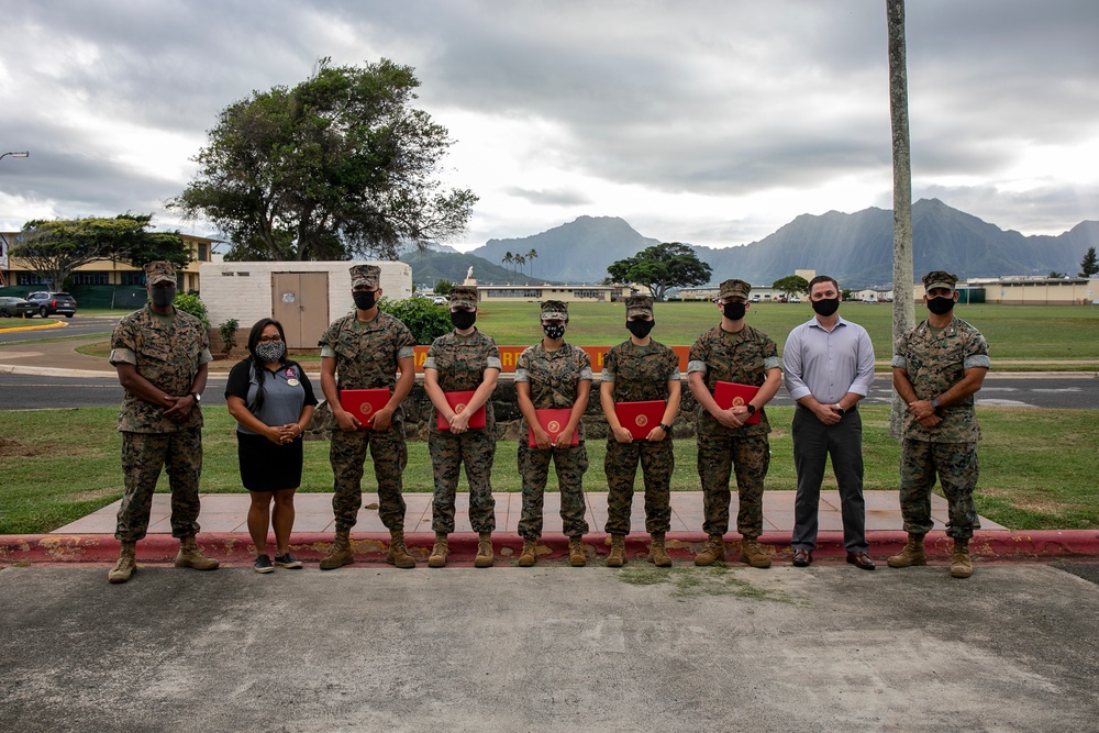 MCBH CO, Sgt. Maj. present awards to the community